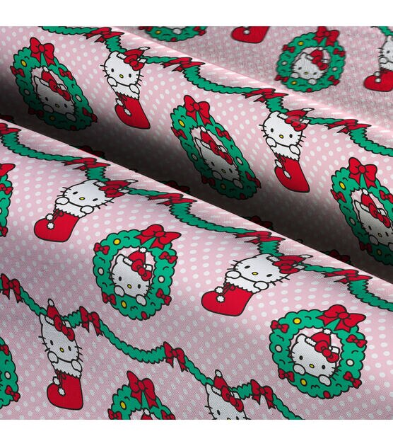 Hello Kitty fabric -- Hello Kitty, bows, and pink polka dots on red -- 100%  cotton quilting fabric