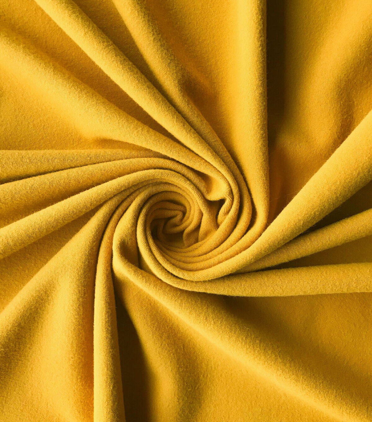 Mineral Yellow Jersey Knit Fabric | JOANN