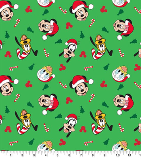 Mickey & Friends on Green Christmas Cotton Fabric | JOANN