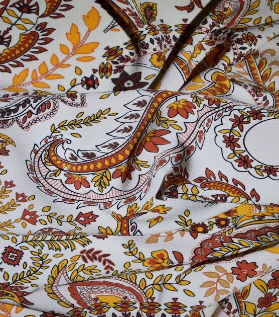Ember Beige Red Yellow Paisley Textured Poly Crepe Fabric | JOANN