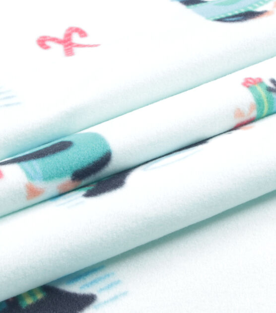 Present Penguins Blizzard Prints Fleece Fabric | JOANN