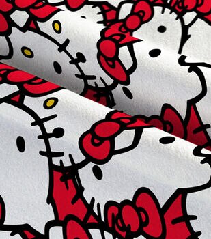 Hello Kitty fabric -- Hello Kitty, bows, and pink polka dots on red -- 100%  cotton quilting fabric