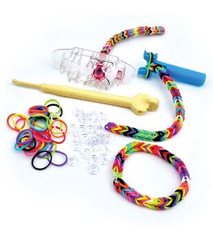 Rubber band keychain made without the loom by John  Rubber band crafts,  Rainbow loom rubber bands, Rubber band bracelet