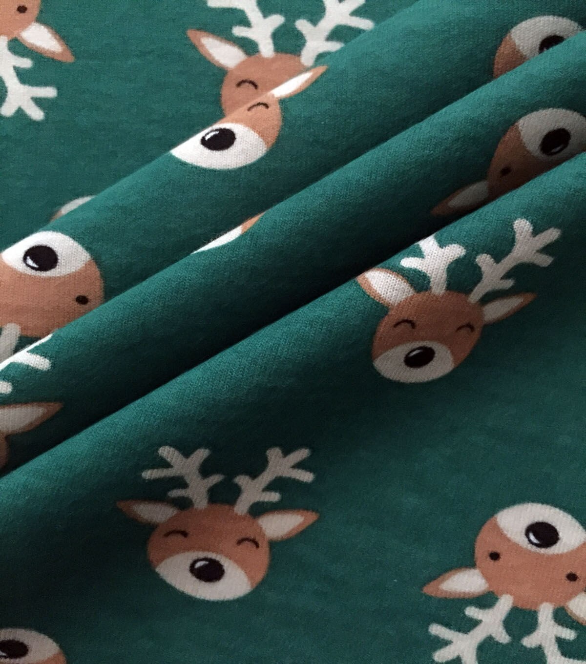 Green Reindeer Pals Jersey Knit Fabric by POP! by POP! | Joann x Ribblr