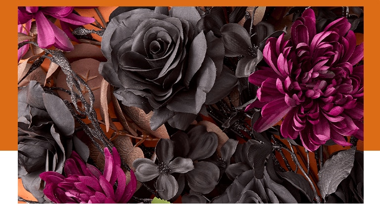 Dark colored floral stems & picks in Halloween vases